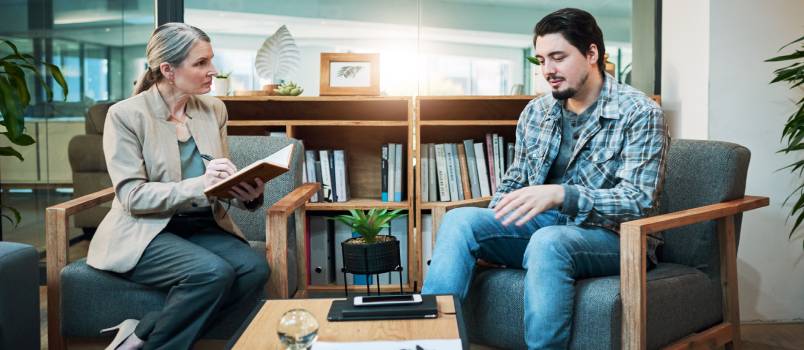 Man having a session with therapist
