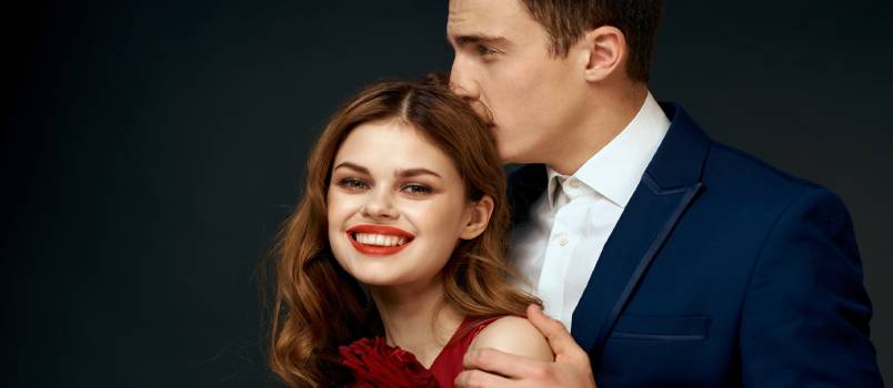 Beautiful couple doing charm hug