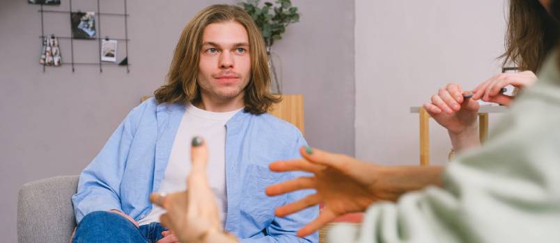 Psychologist helping couple