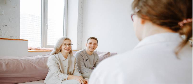Couple listening to therapist