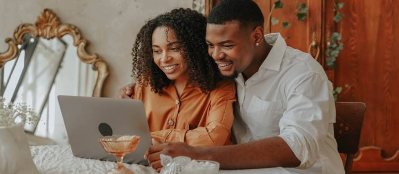 Couple working on laptop