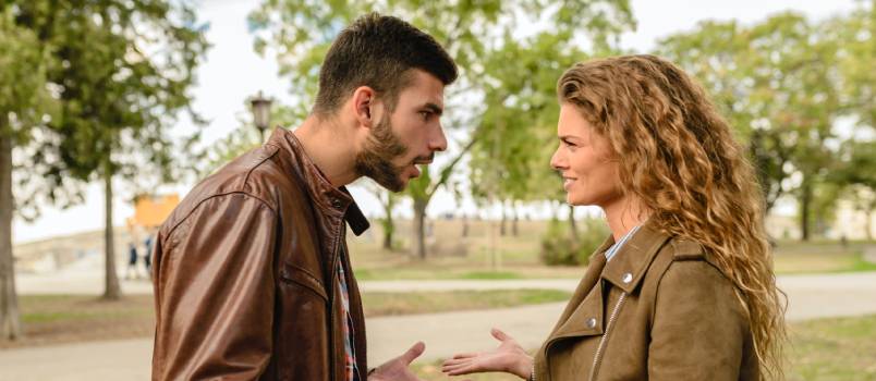 Couple having an argument in park