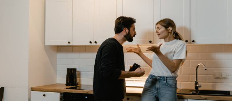 Couple having an argument in kitchen