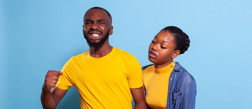 Frustrated couple loosing video game