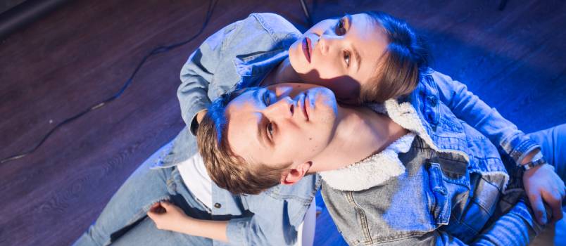 Unhappy couple looking in sky