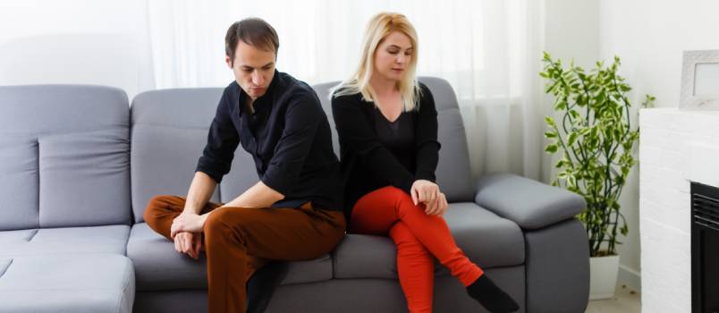 Unhappy couple talking to physiologist
