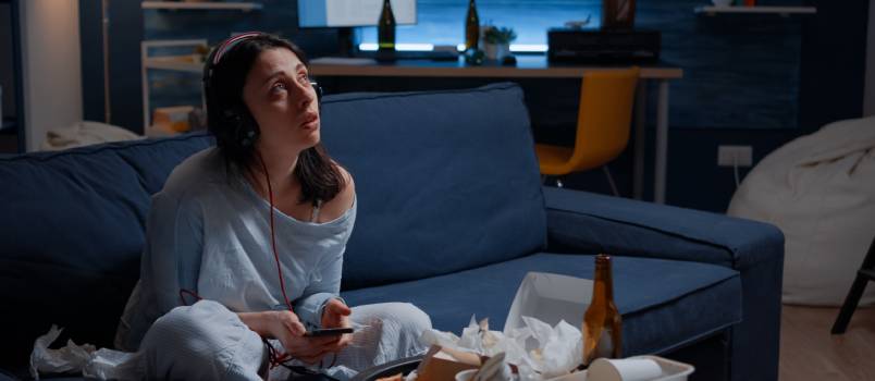 anxious woman listening to music