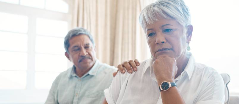 Man consoling his sad wife