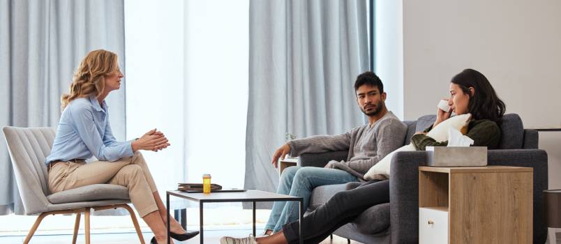 Couple having counseling session with therapist