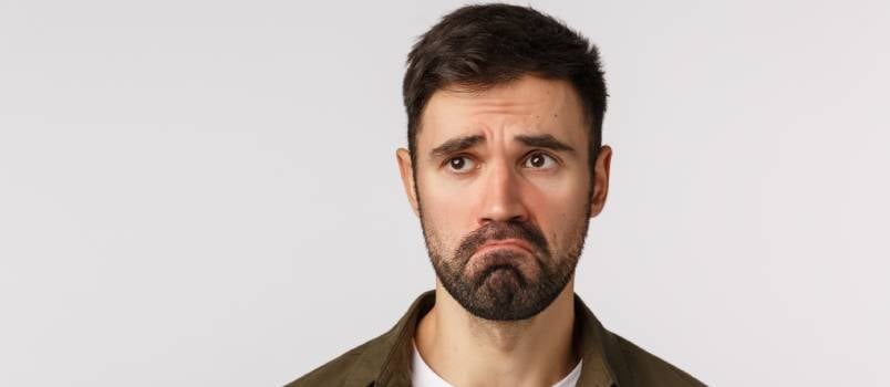 Man showing sad expression