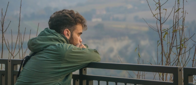 Man watching sunset while resting