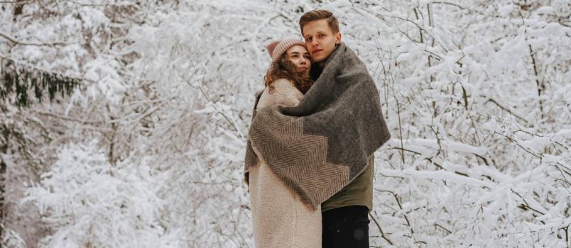 couple hugging outside in winter 