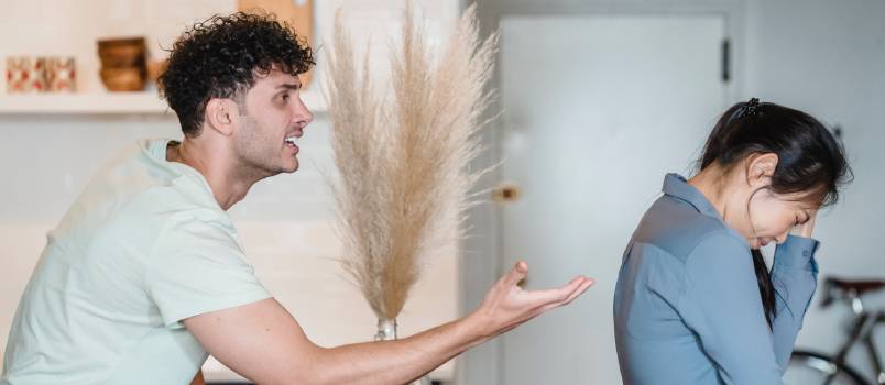 man talking to upset partner