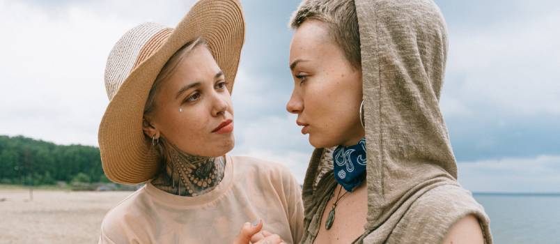 Woman comforting woman