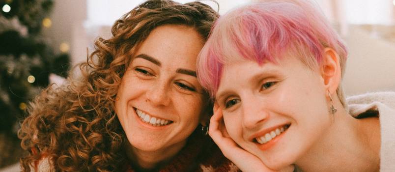 Happy lesbian couple smiling