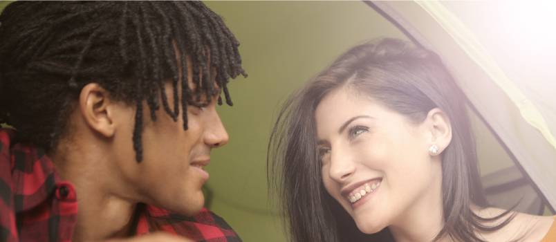 Cheerful couple looking at each other