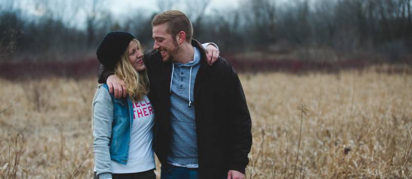 Happy couple near field