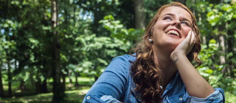 Woman looking up smile