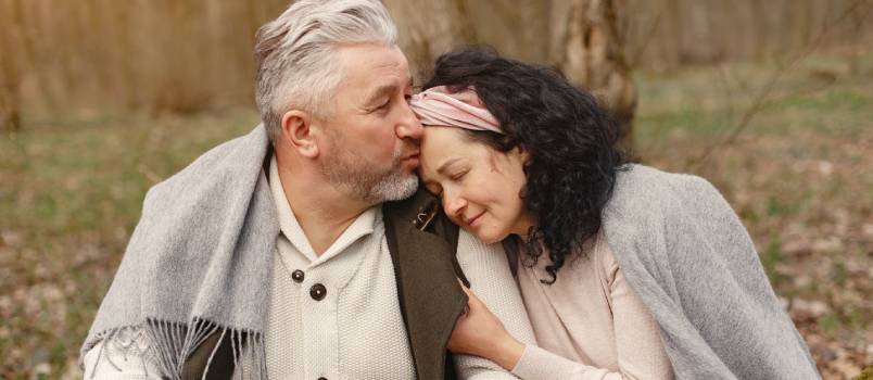 Senior couple hugging