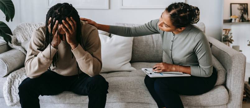 Woman consoling her boyfriend