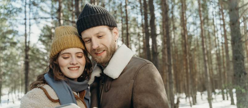 Couple looking at screen 