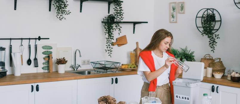 Woman utilizing waste