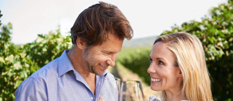 Couple enjoying wine outside