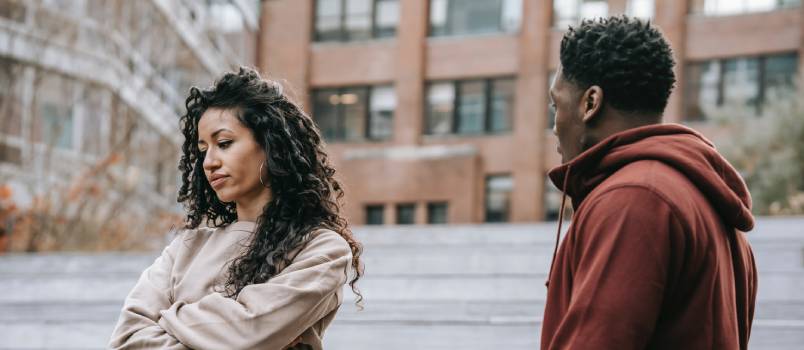 Couple arguing in city