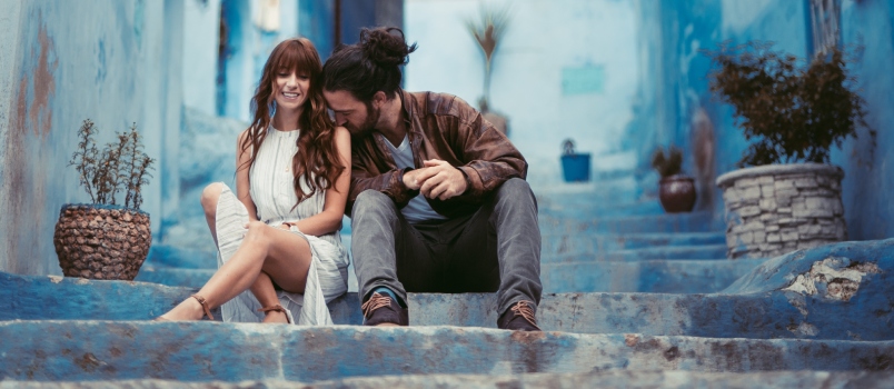 Couple sitting on a stairs