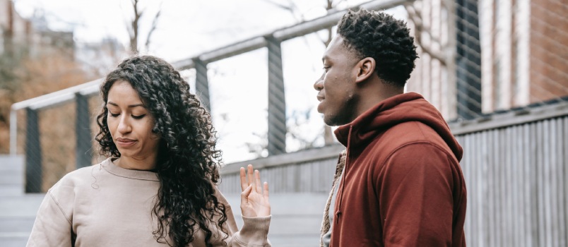 Couple arguing on street