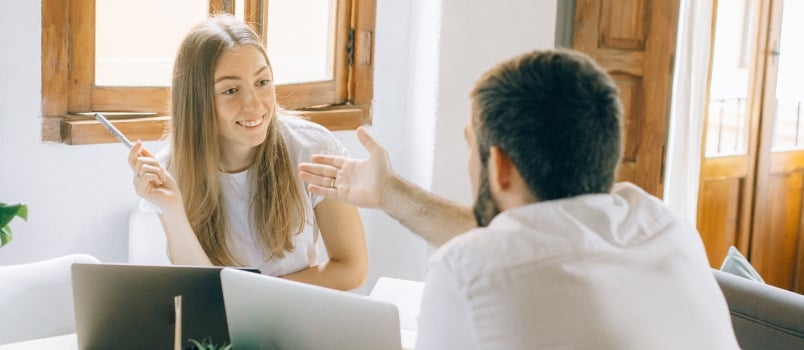 Man and woman discussing work