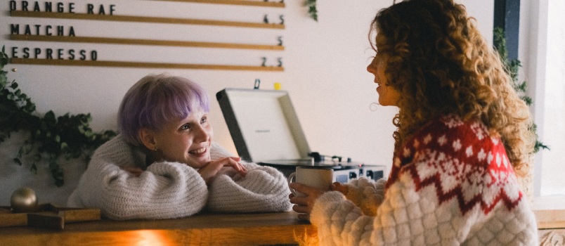 Two woman talking to each other
