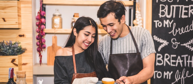 Couple doing baking together