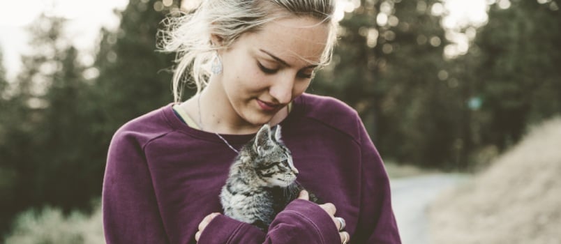 Woman holding cat