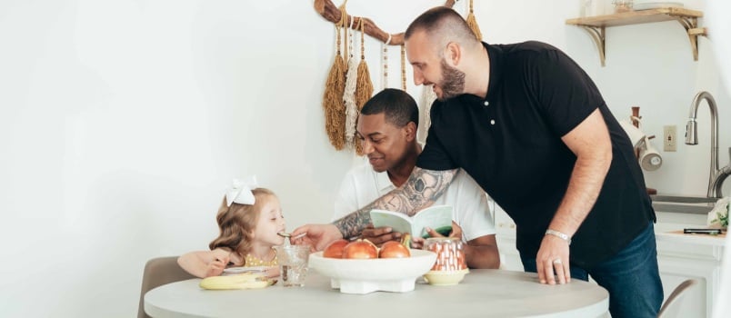 Happy man with child at home
