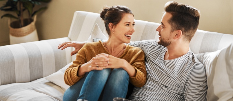Couple relaxing on sofa
