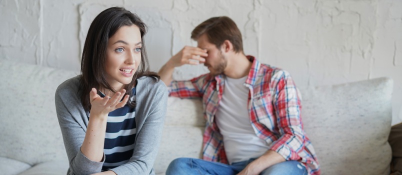 Young couple talking about their problems with psychologist