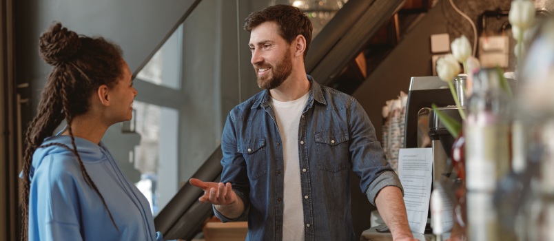 Couple talking in cafe