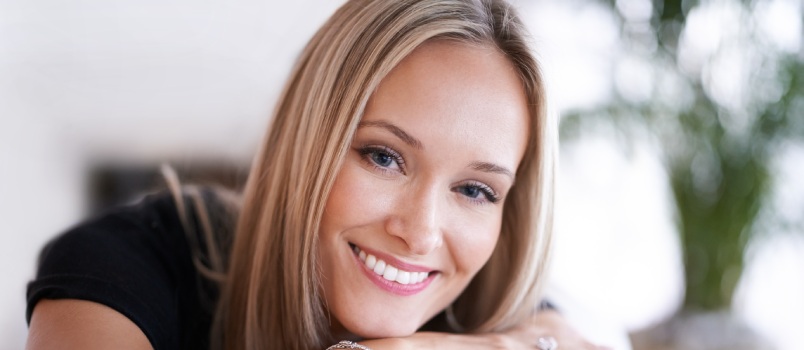 Smiling woman looking into camera
