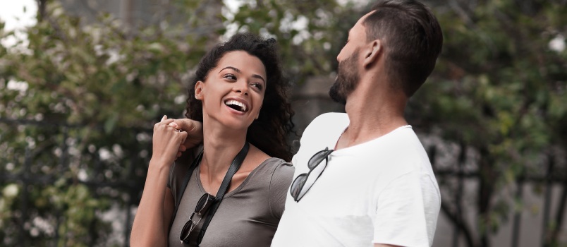 Young couple walking on street