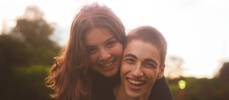 Man and woman smiling