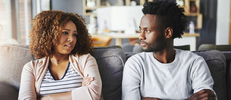 Unhappy couple talking about problems 