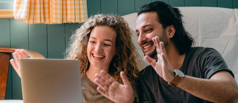 Man and woman talking on video call