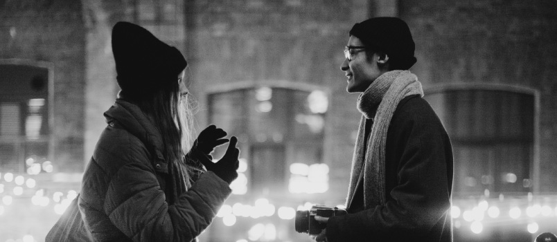 Couple talking outside