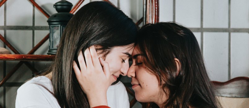 Lesbian couple kissing each other