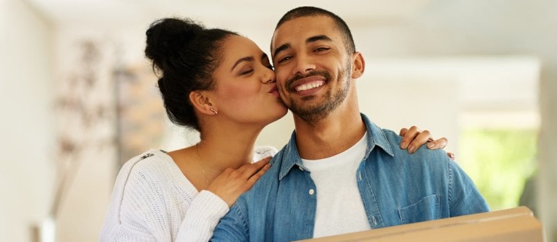 Happy couple shifting to new home