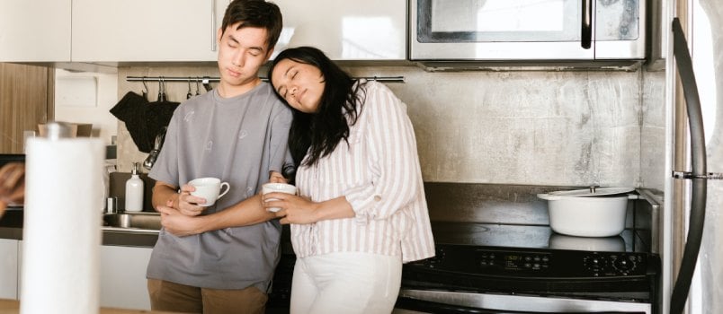 Woman leaning on man