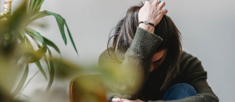 Upset lady sitting on the chair