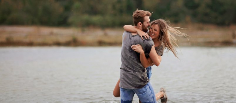 Couple enjoying in lake