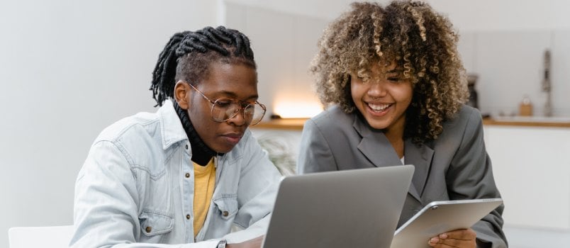 Couple having conversation sitting near table